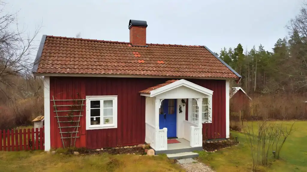 Hauptansicht des Ferienhauses Hus Bohult in Berga – rotes Schwedenhaus in Småland