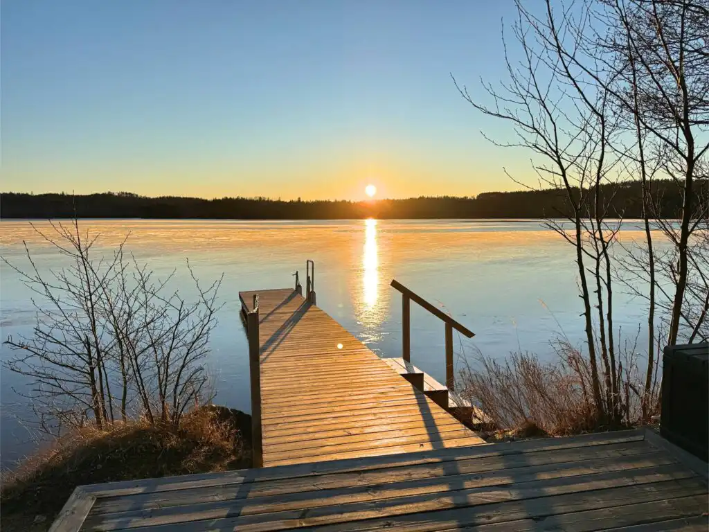 Sonnenuntergang am See bei Stuga Sjögolf in Storebro