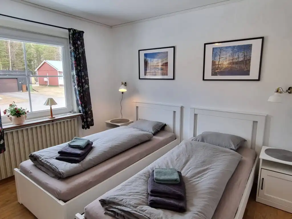 Großes Schlafzimmer im Ferienhaus Villa Edda in Lappland Schweden