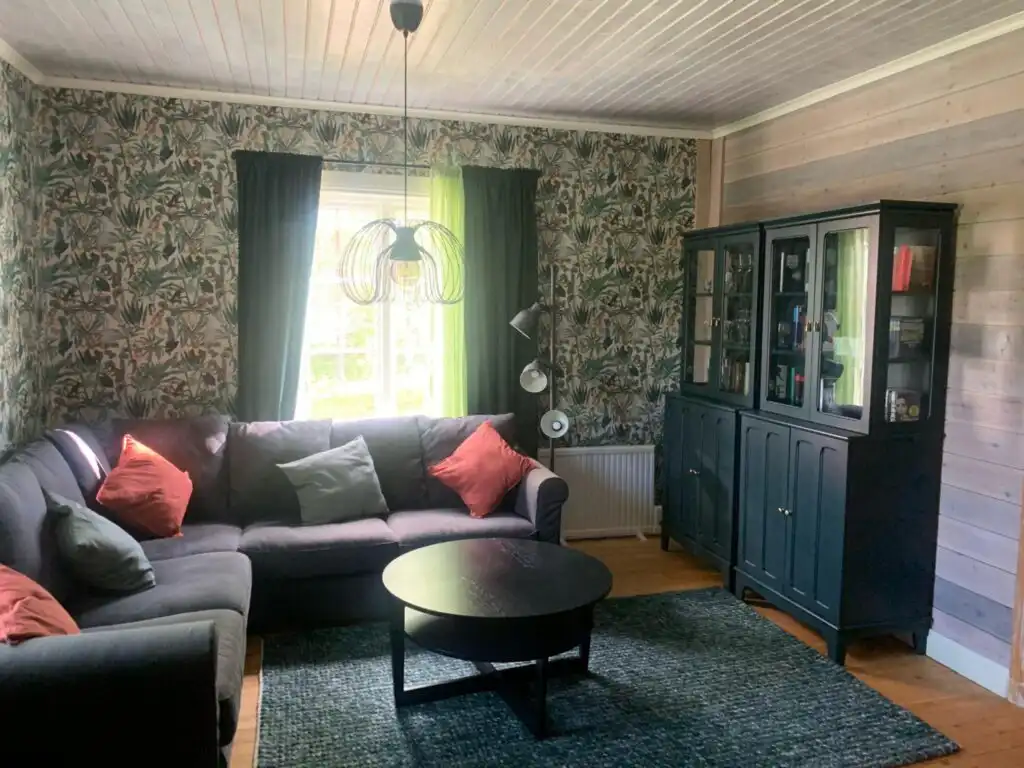 Wohnzimmer im Ferienhaus Hus Siknäs im skandinavischen Stil