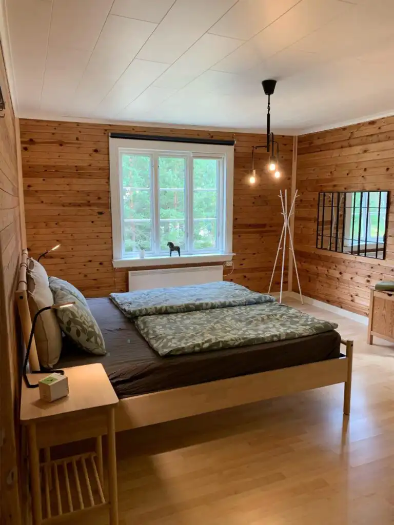 Schlafzimmer im Ferienhaus Hus Siknäs im rustikalen Stil