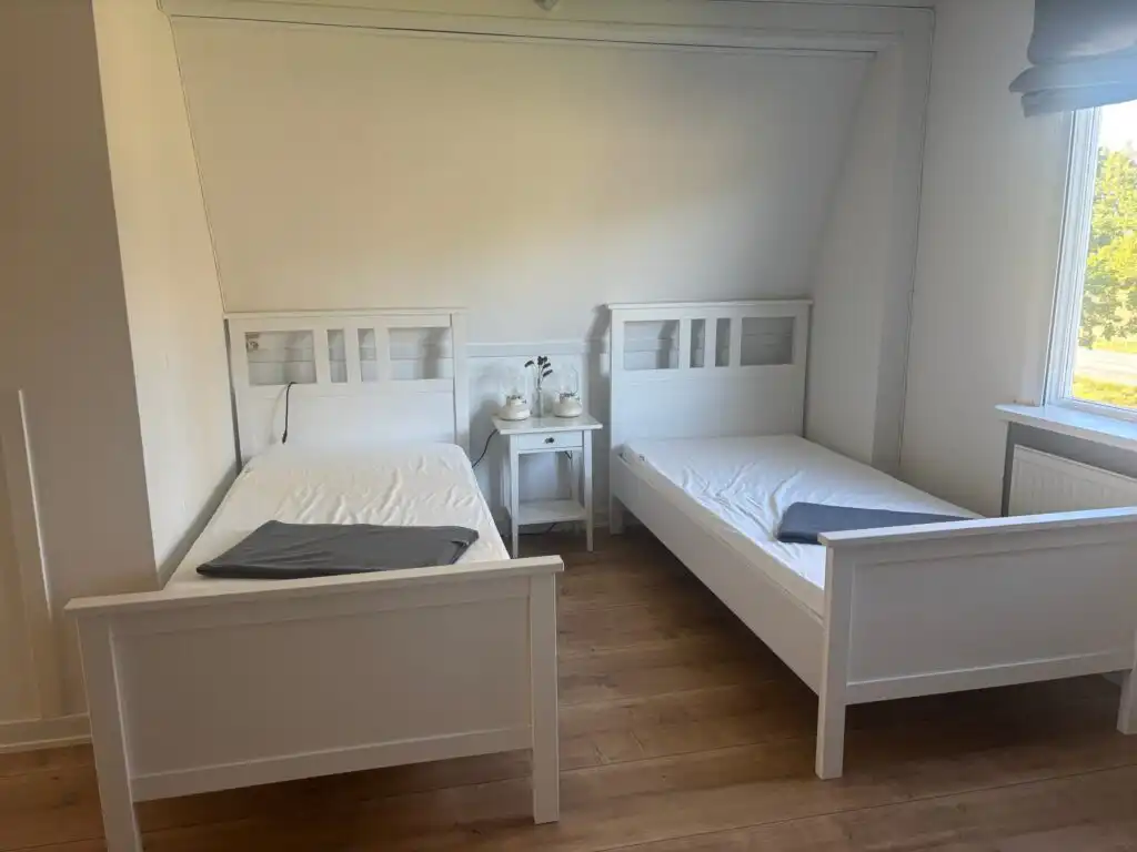 Schlafzimmer im Ferienhaus Hus Brobacka – Ferienhaus für Urlaub in der Seenregion