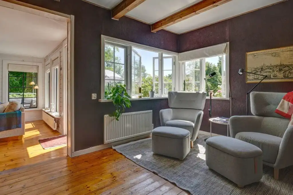 Wohnzimmer im Ferienhaus Peaceful Getaway – heller Wohnbereich im Schwedenhaus