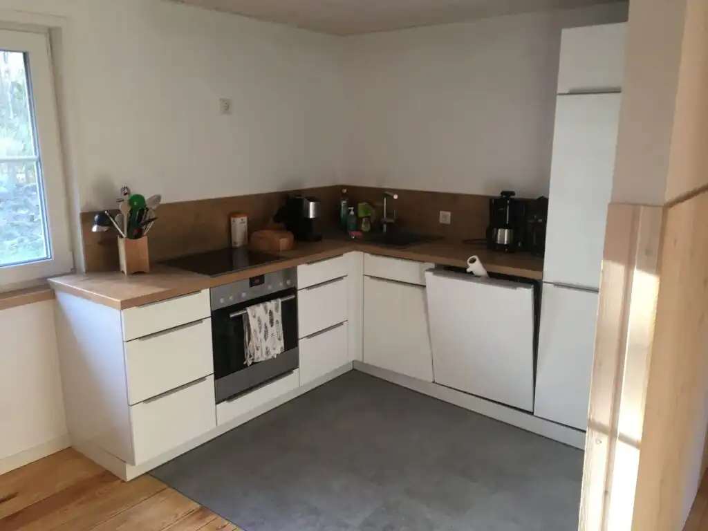 Offene Küche mit Essbereich im Ferienhaus Villa Yasjö