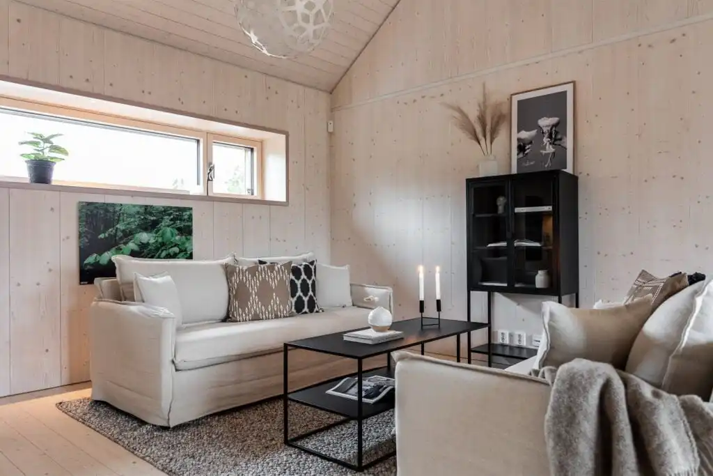 Gemütliches Wohnzimmer im Design Ferienhaus CIRCUITUS in Småland